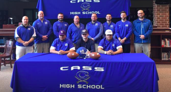 Three Colonels Sign the Dotted Line